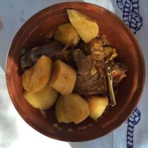 In Amorgos, trythe local specialty patatato (goat with potatoes) 