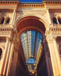 One of the four entrances to the Galleria Vittorio Emanuele II, one of Milan 's landmarks