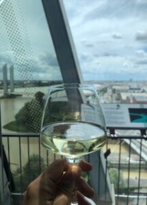 a glass of wine at the 8th-floor bar