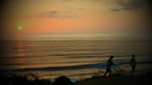 Surfing till the sun goes down in Bali