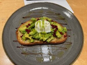 Avocado on toast at Lucky Jim's, one of my favourite bookshop cafes in London
