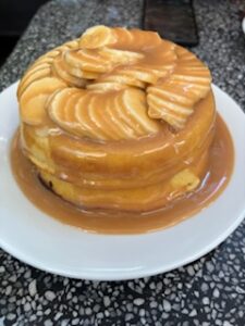 Corn pancakes with dulce de leche (cajeta) sauce and sliced banana at El Tigrillo