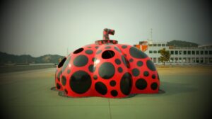 Kusama's red polka-dotted pumpkin at Miyanoura Port