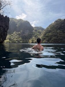 Kayangan Lake, a crystal-clear lake surrounded by limestone cliffs